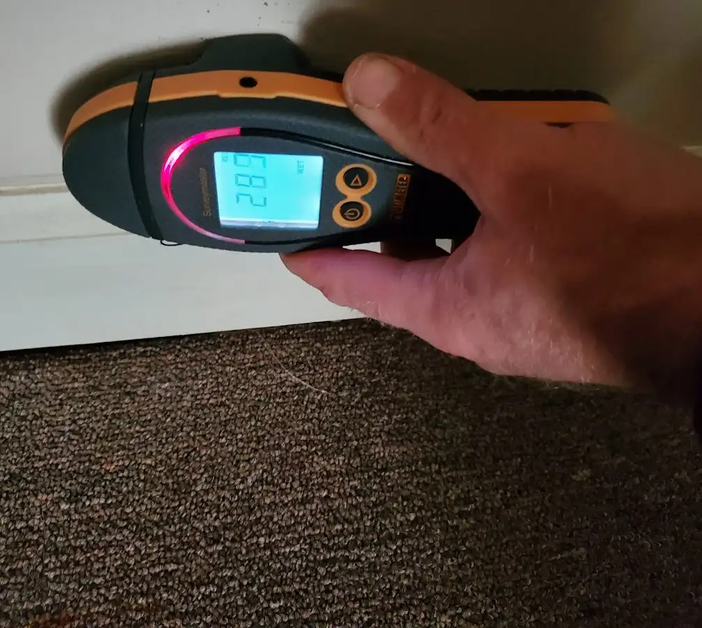 Moisture detection at baseboard during Storm Damage Restoration in South Pasadena